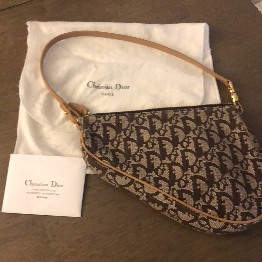 Authentic vintage Diorissimo Saddle Pochet…